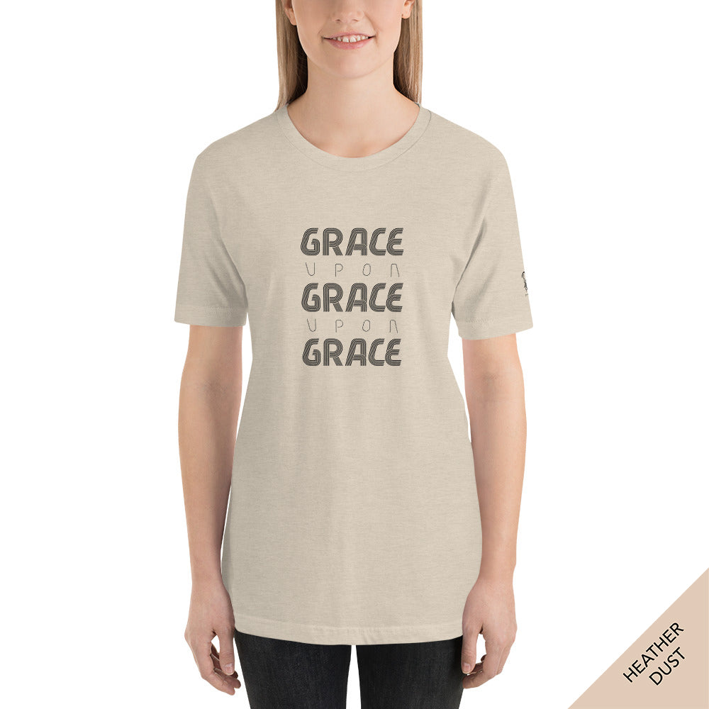 FRONT VIEW - Grace Upon Grace t-shirt In heather dust adorned with typography and inspired by the Bible verse John 1:16 ESV.