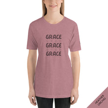 Load image into Gallery viewer, FRONT VIEW - Grace Upon Grace t-shirt In heather orchid adorned with typography and inspired by the Bible verse John 1:16 ESV.
